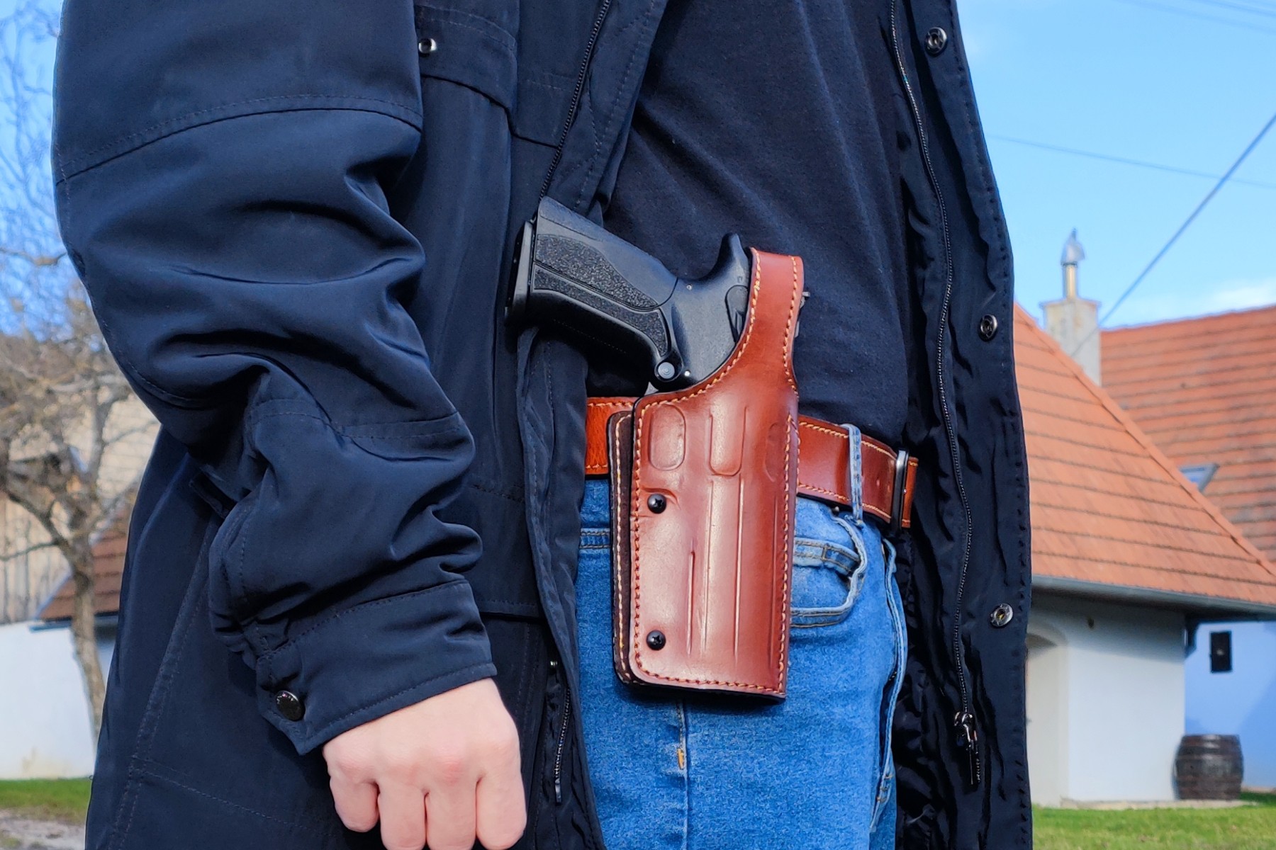 OWB Holster with adjustable retention